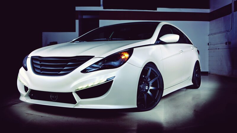 white sports car in garage