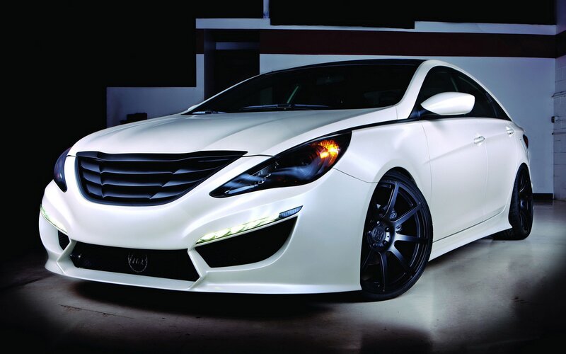 white sports car in garage