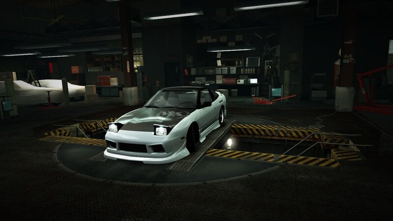 white sports car in garage