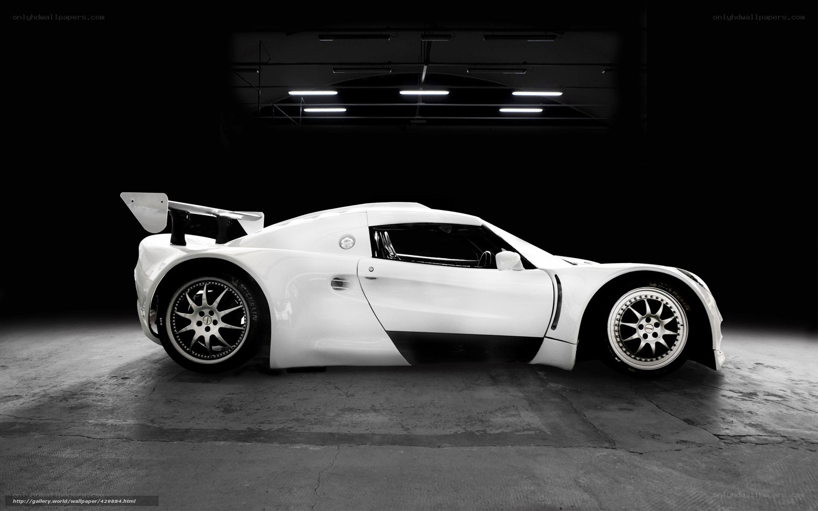white sports car in garage