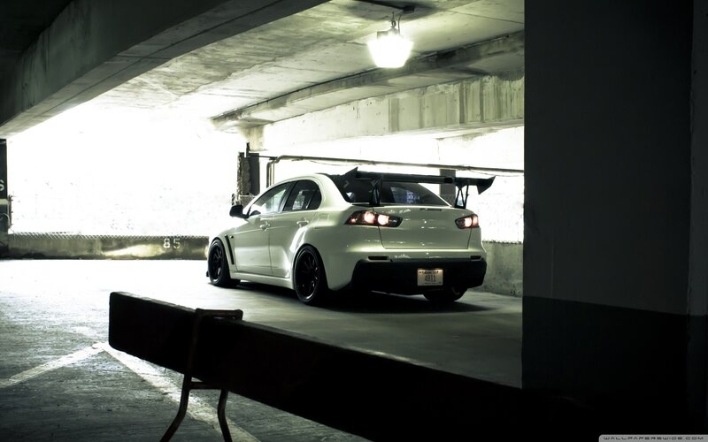 white sports car in garage