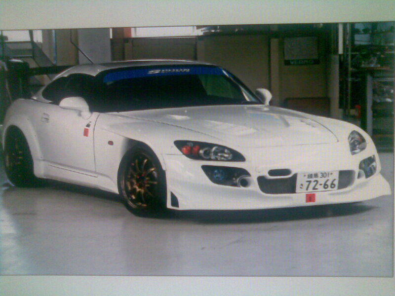 white sports car in garage