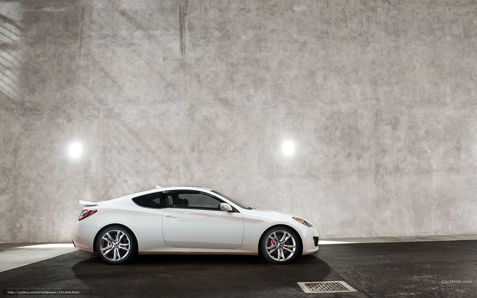 White sports car in garage