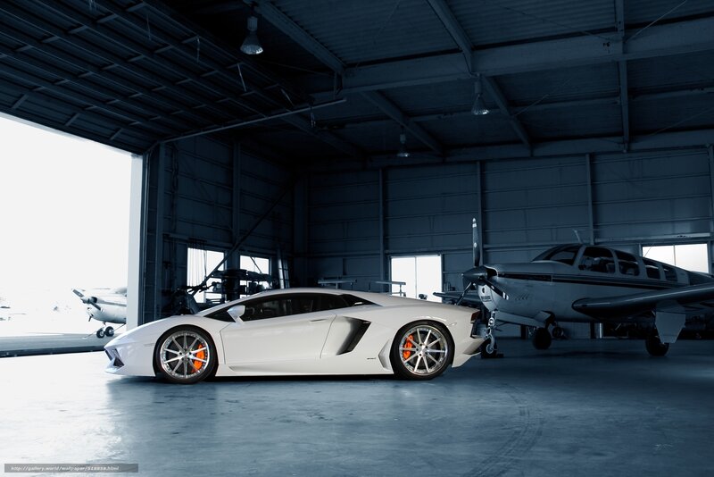 White sports car in hangar