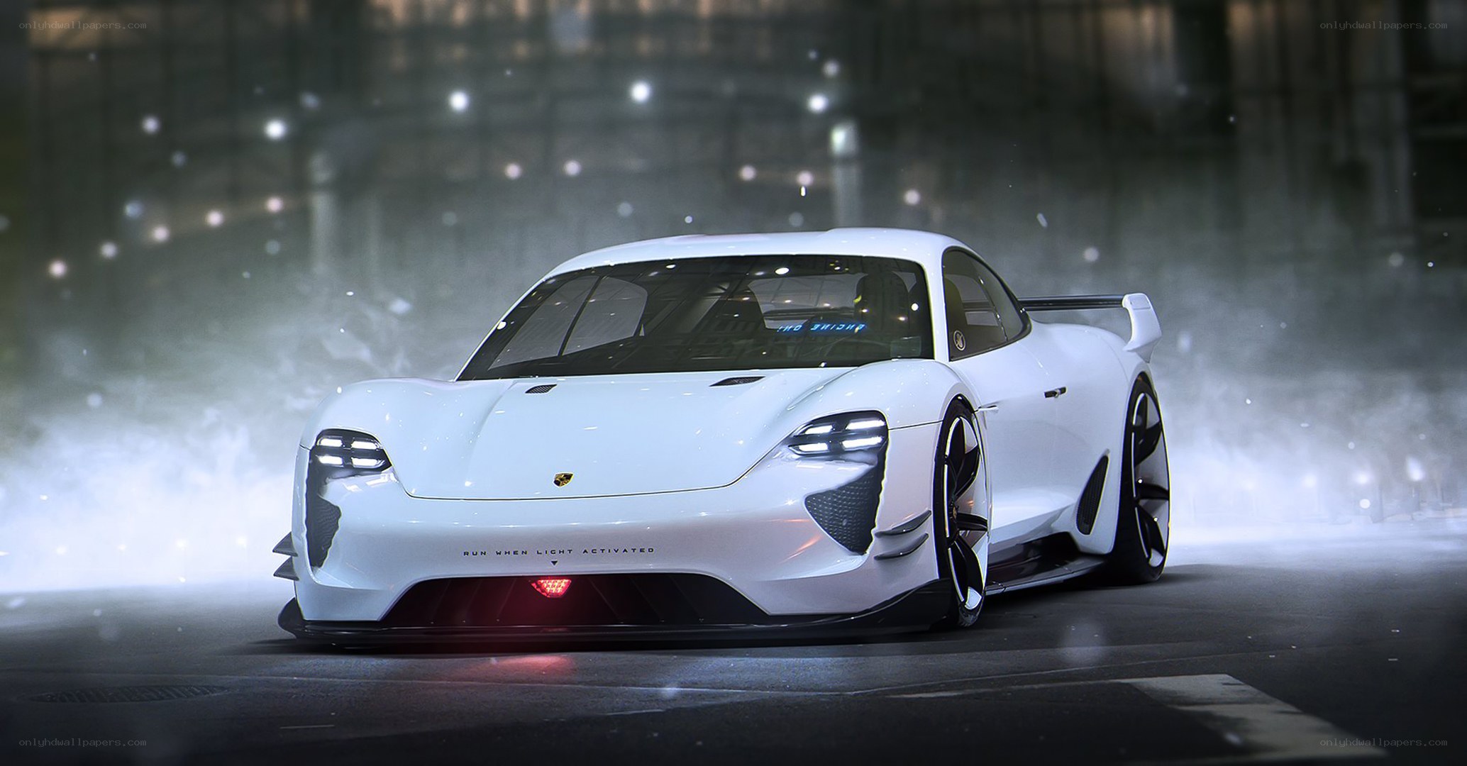 white sports car in mist