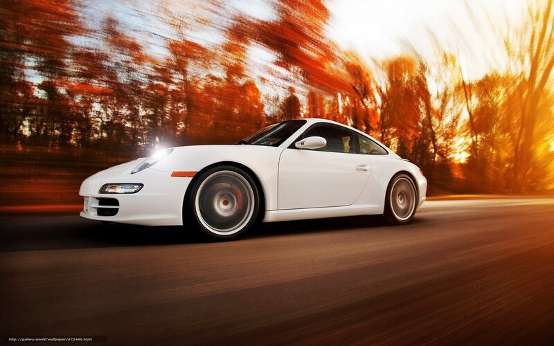 white sports car in motion