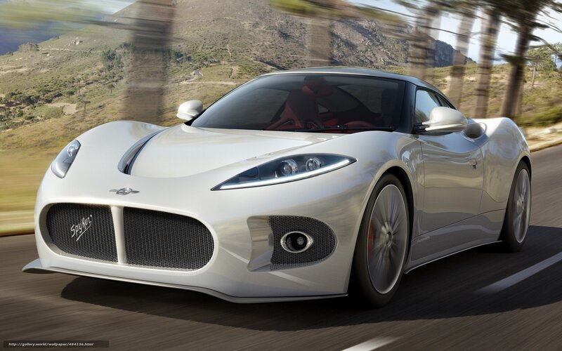 white sports car in motion