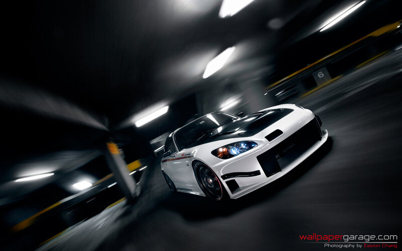 white sports car in motion