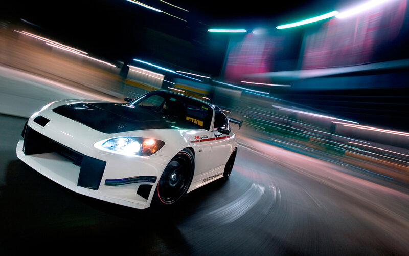 white sports car in motion