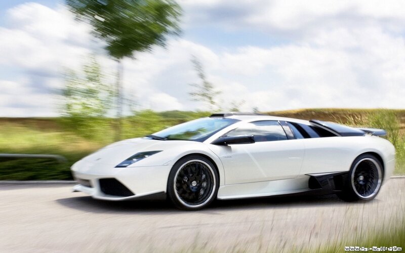 white sports car in motion