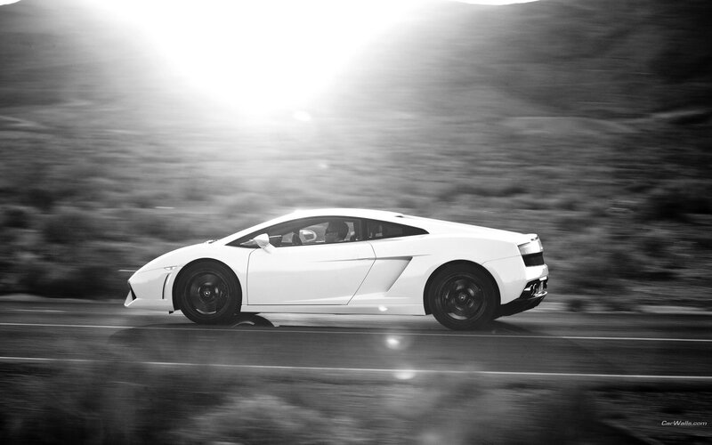 white sports car in motion