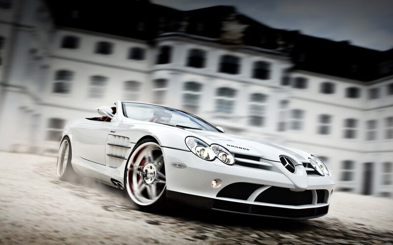 white sports car in motion