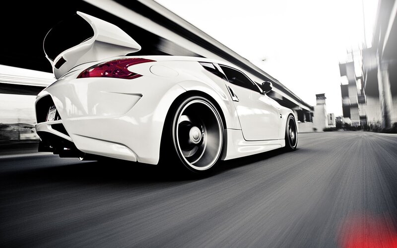 white sports car in motion