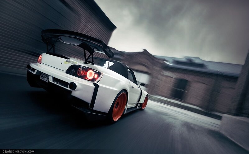 white sports car in motion