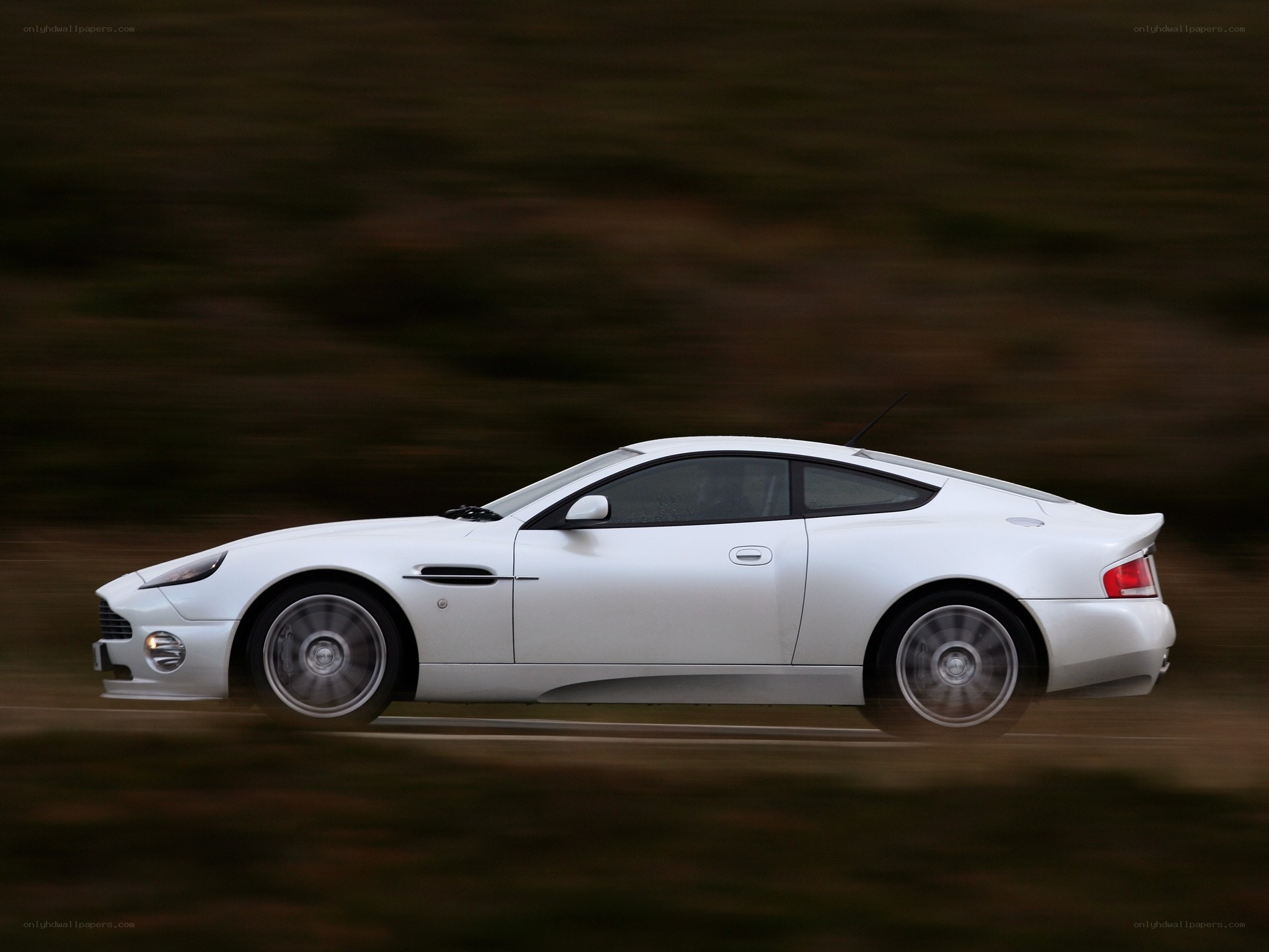 white sports car in motion