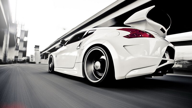 white sports car in motion