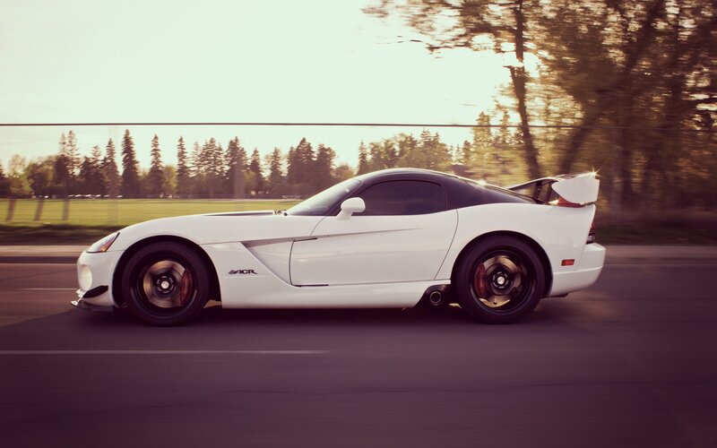 white sports car in motion