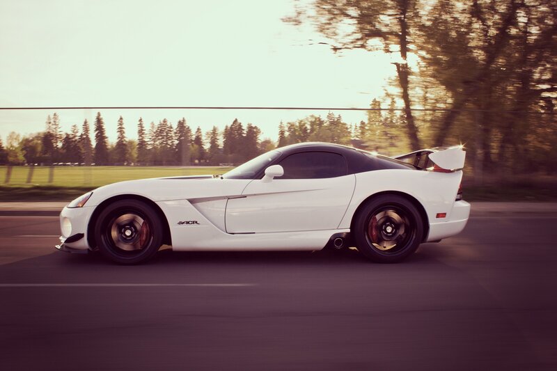 white sports car in motion