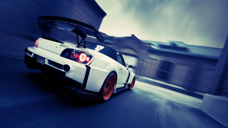 white sports car in motion