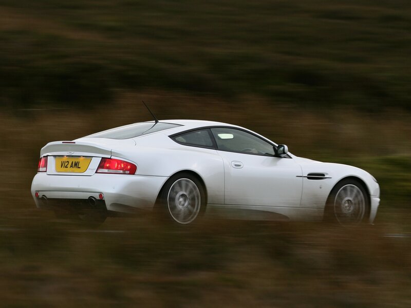 white sports car in motion