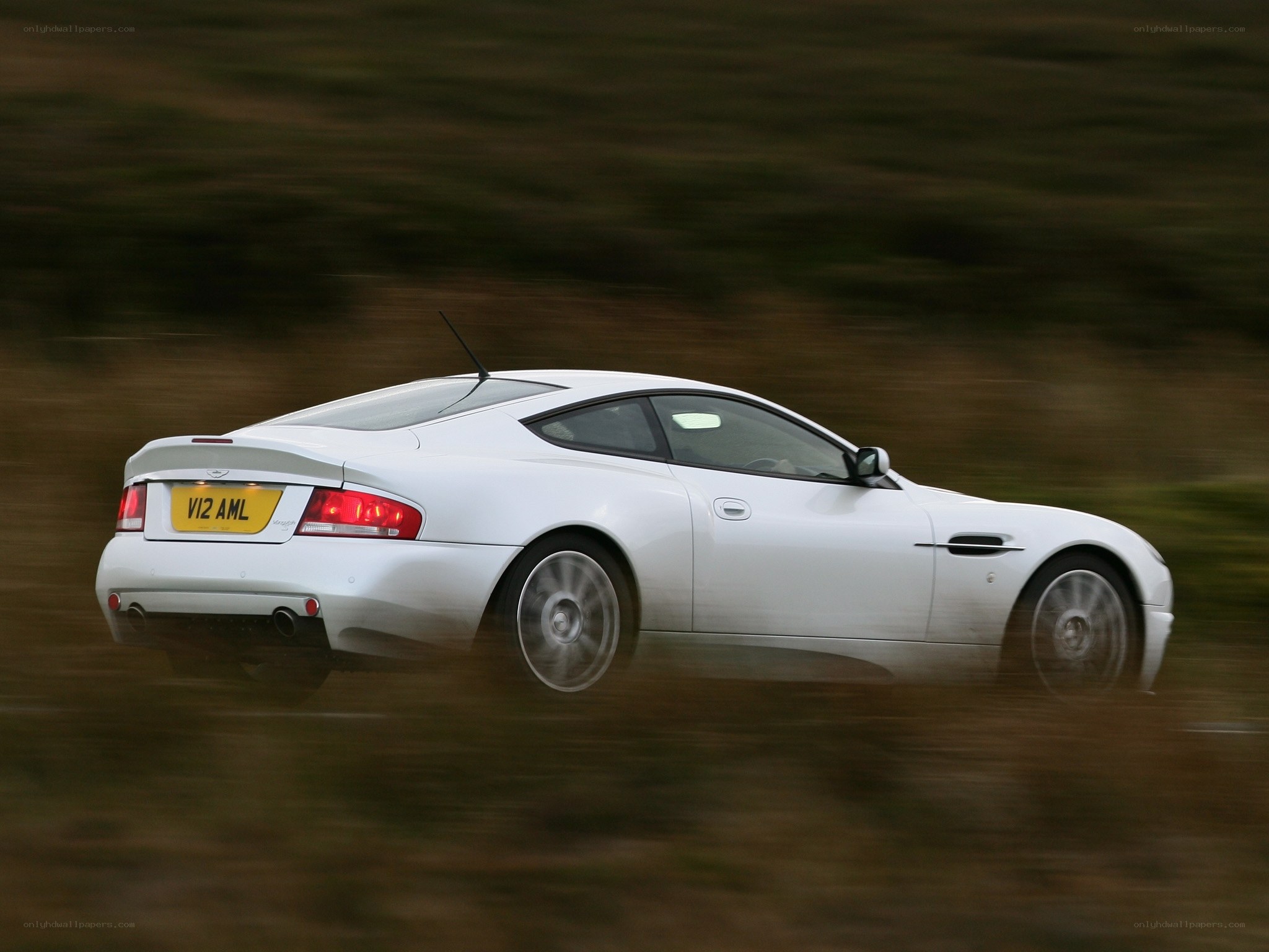 white sports car in motion