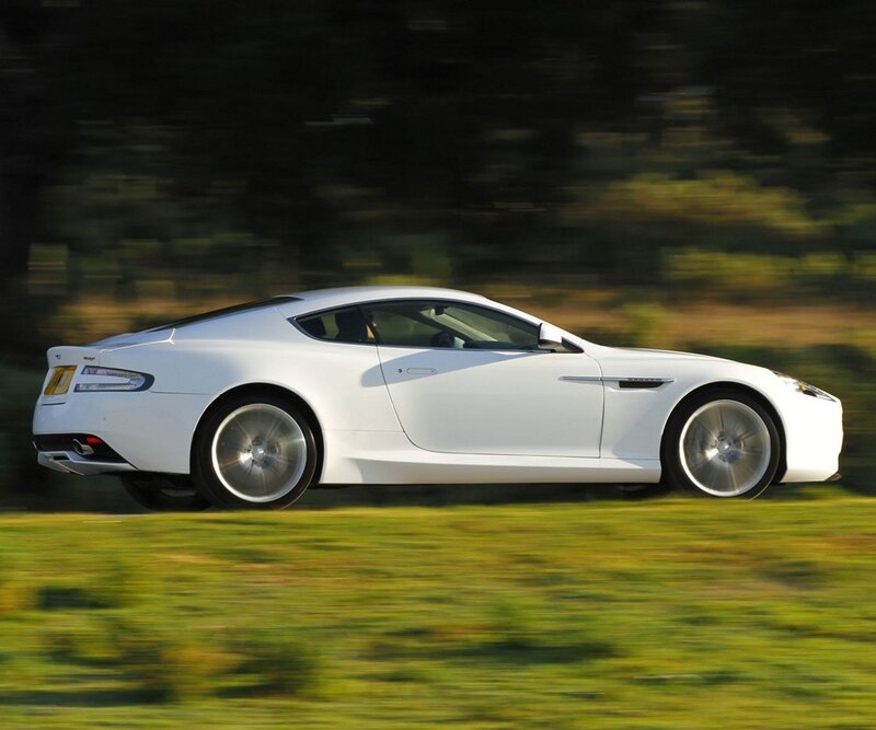 white sports car in motion