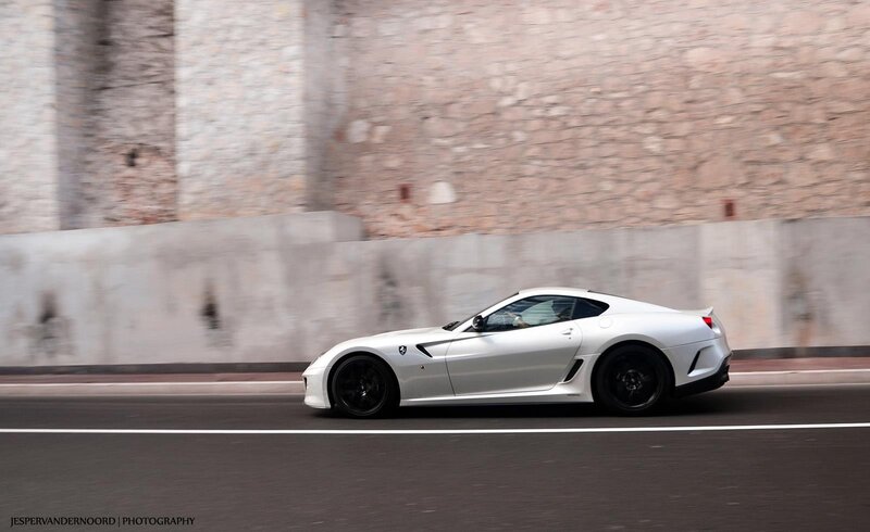 white sports car in motion