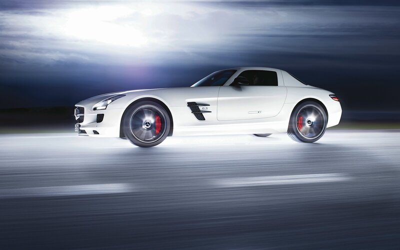 white sports car in motion