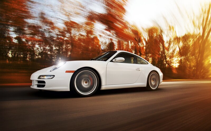 white sports car in motion