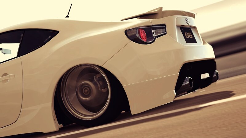 white sports car in motion