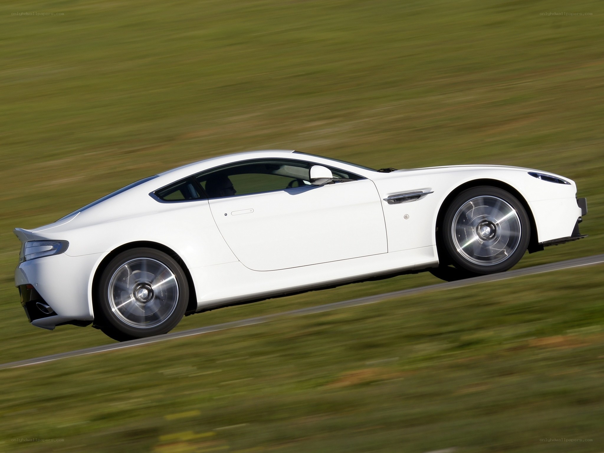 white sports car in motion