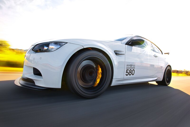 white sports car in motion