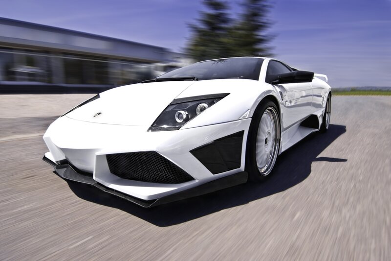 white sports car in motion