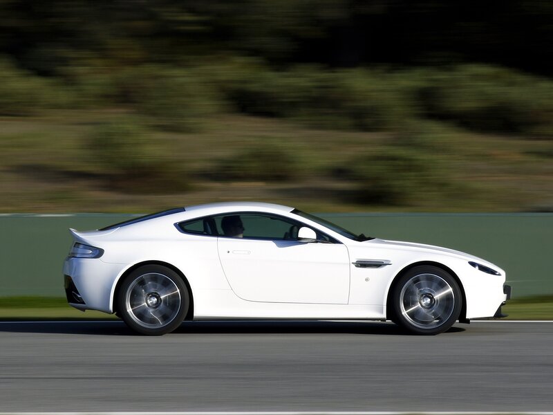 white sports car in motion