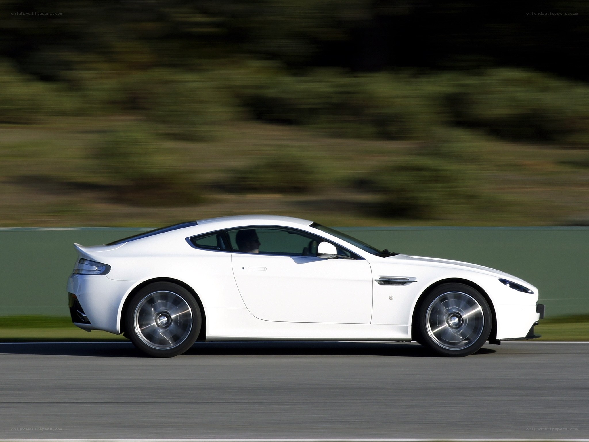 white sports car in motion