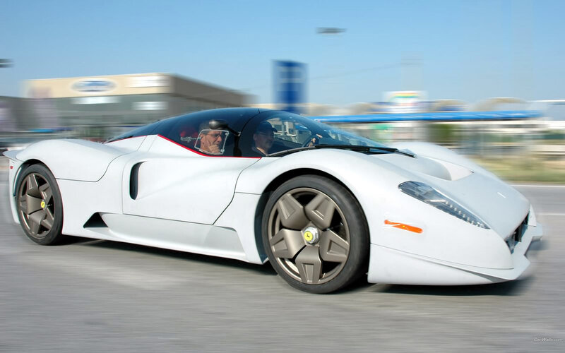 white sports car in motion