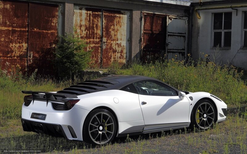 white sports car in overgrown lot