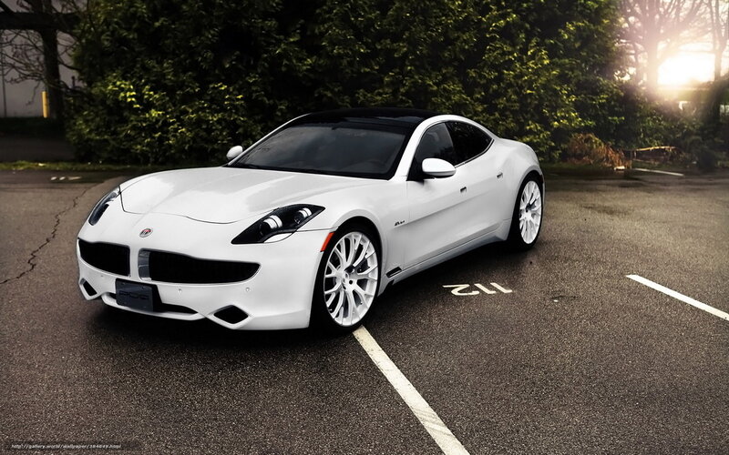 White sports car in parking lot