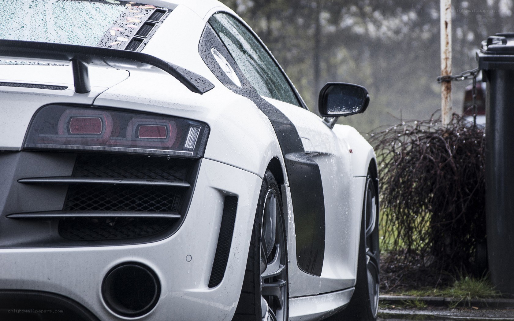 white sports car in rain