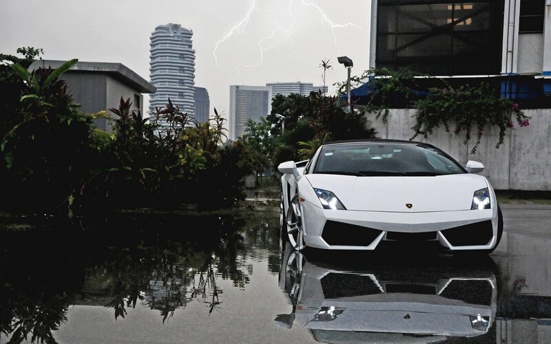 White Sports Car in Rain — Dramatic