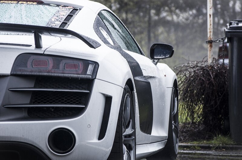 white sports car in rain