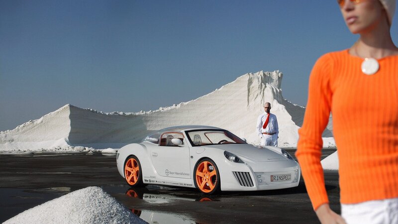 White sports car in salt field