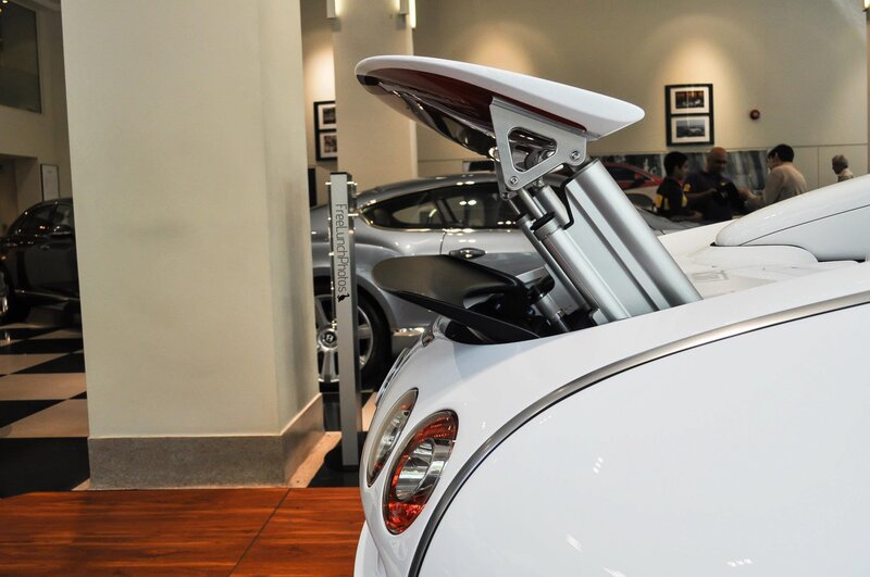 White sports car in showroom