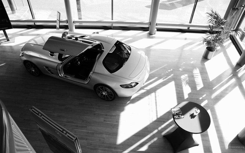 White sports car in showroom