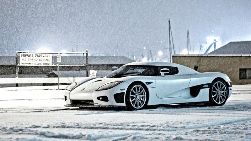 White sports car in snow