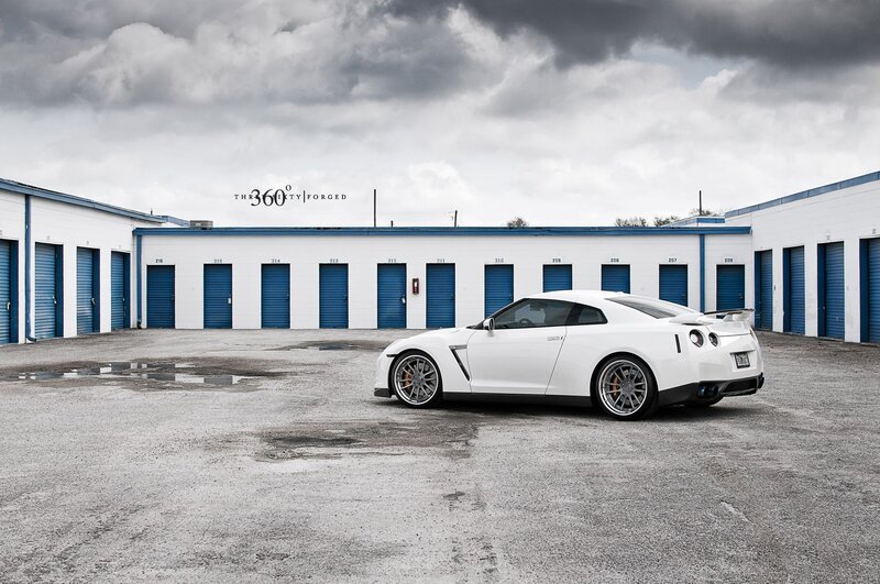 White sports car in storage lot