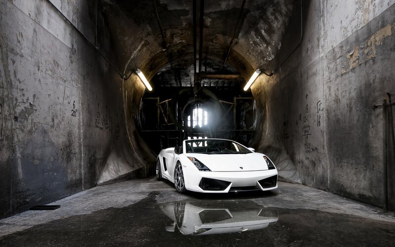 White sports car in tunnel