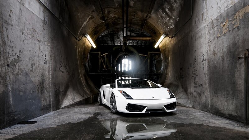 White Sports Car in Tunnel — Dramatic, Photograph, Graffiti