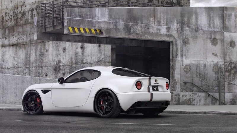 white sports car in urban setting