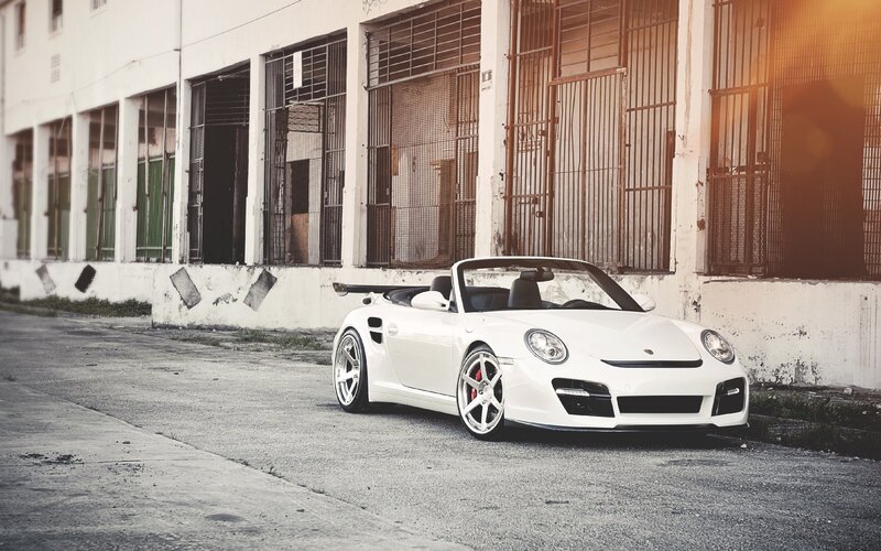 white sports car in urban setting